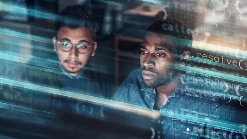 Two men working on digital policy