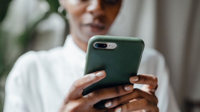 woman holding phone